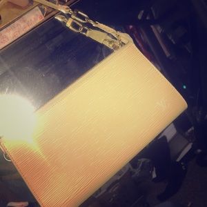 Louis Vuitton light yellow /cream colored clutch